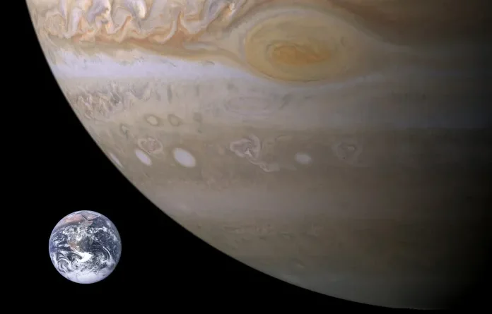 how many earths can fit into jupiter
